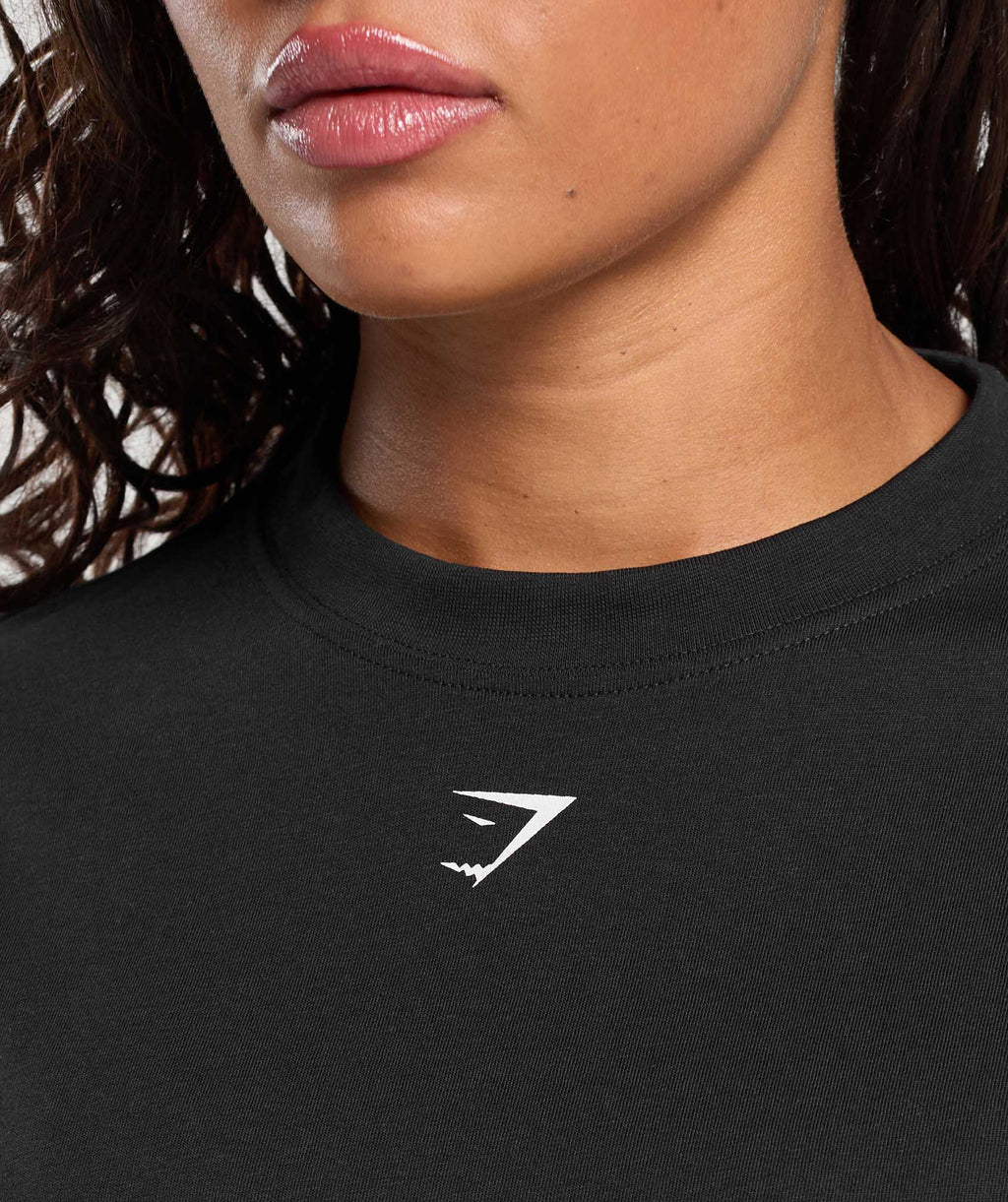 "STRENGTH GRAPHIC" Oversized training shirt